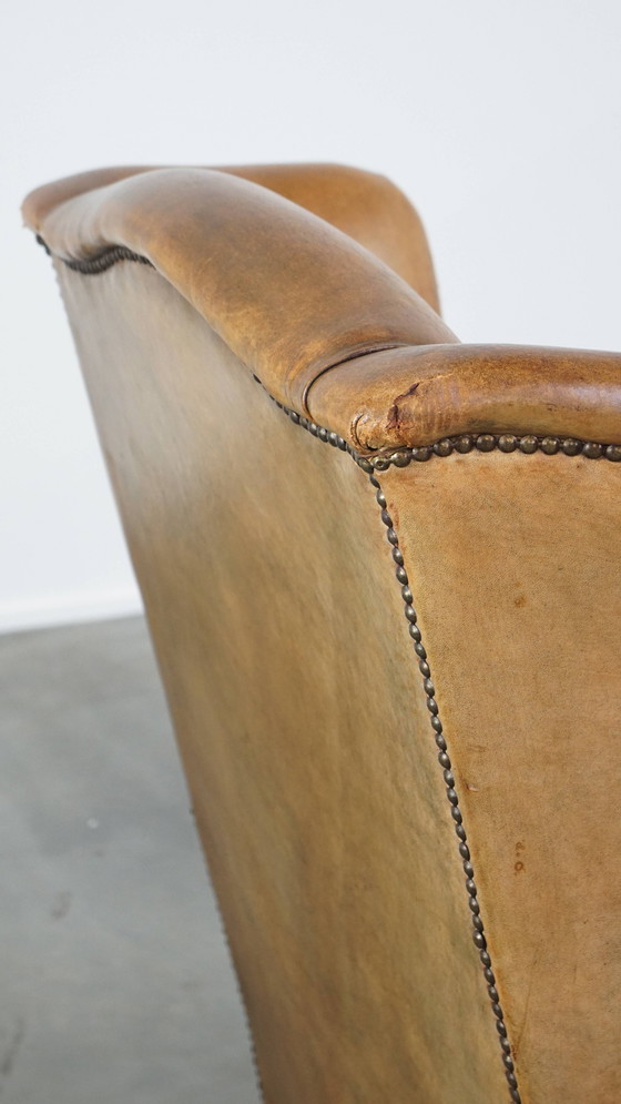 Image 1 of Fauteuil à oreilles en peau de mouton