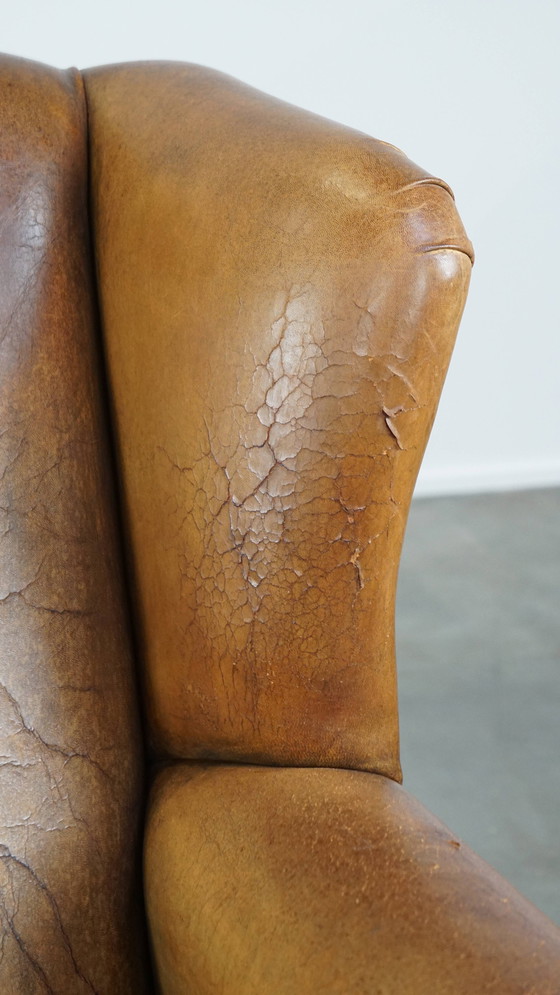 Image 1 of Fauteuil à oreilles en peau de mouton