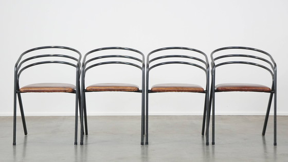 Image 1 of 4 X Chaise de salle à manger design avec assise en cuir et structure en métal