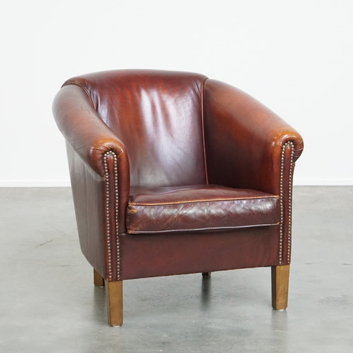 Fauteuil club en peau de mouton couleur cognac