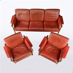 Salon vintage rouge en cuir et bois de rose - années 1960