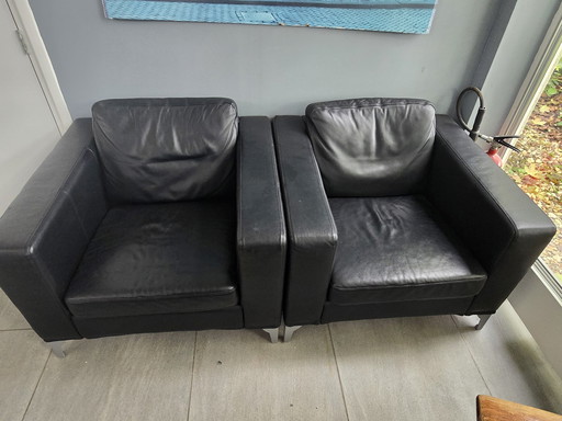 Fauteuil en cuir noir 4 pièces