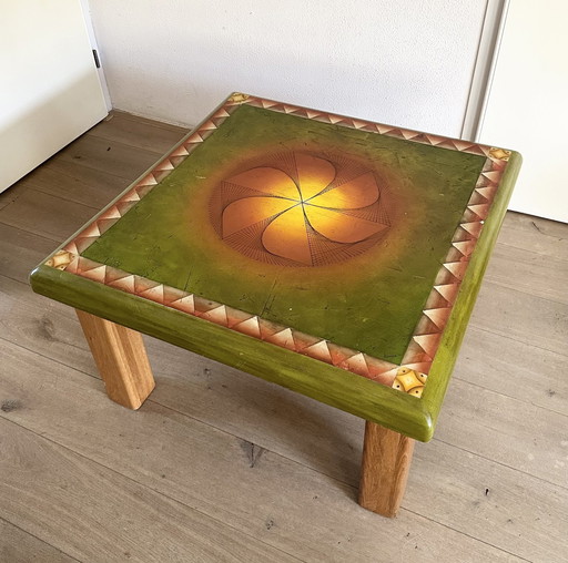 Table basse avec plateau d'art