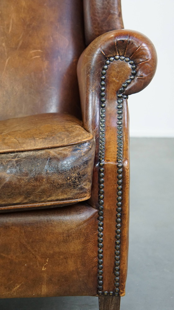 Image 1 of Grand fauteuil vintage à oreilles en cuir de mouton