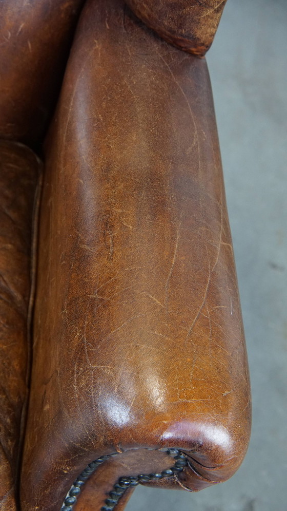 Image 1 of Grand fauteuil vintage à oreilles en cuir de mouton