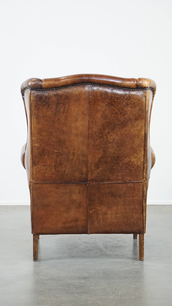 Image 1 of Grand fauteuil vintage à oreilles en cuir de mouton