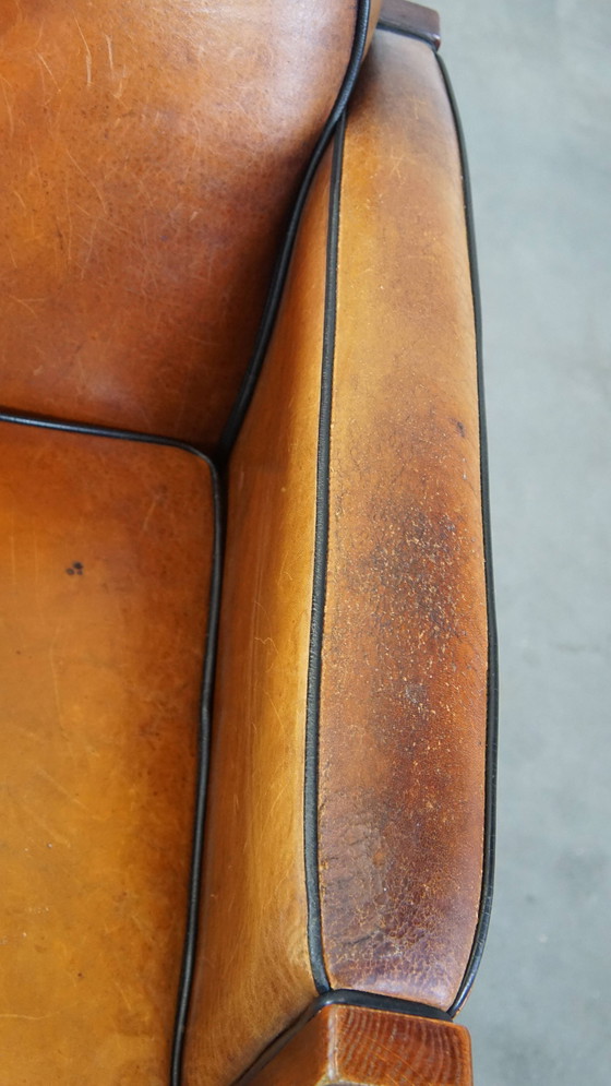 Image 1 of Fauteuil Art Déco en bois et cuir de mouton