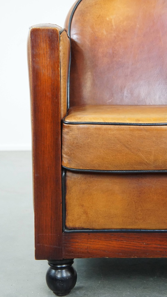 Image 1 of Fauteuil Art Déco en bois et cuir de mouton