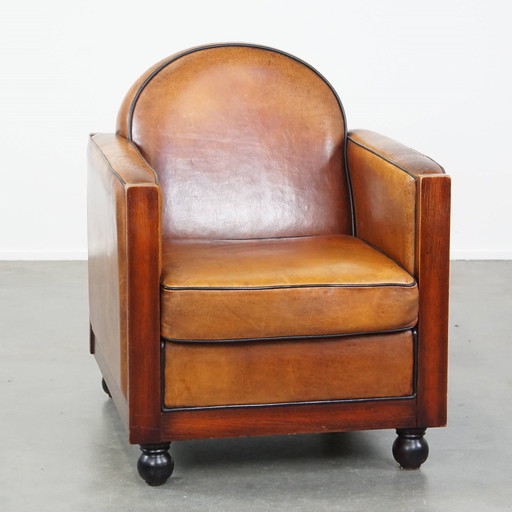 Fauteuil Art Déco en bois et cuir de mouton