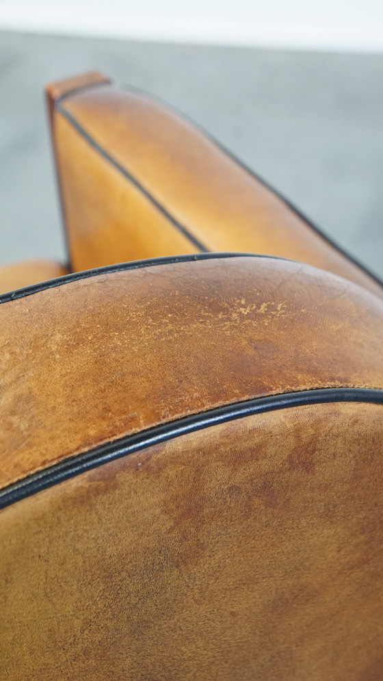 Image 1 of Fauteuil Art Déco en bois et cuir de mouton