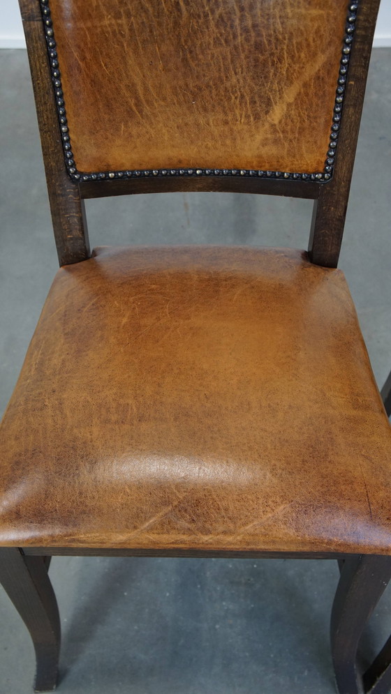 Image 1 of 4 X Chaise de salle à manger en peau de mouton combinée avec du bois