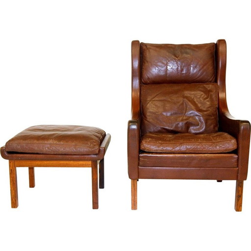 Fauteuil vintage en cuir et palissandre avec repose-pieds, Danemark 1960