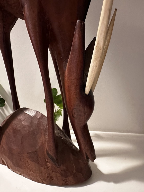 Image 1 of Décoration vintage sculptée en bois cerf