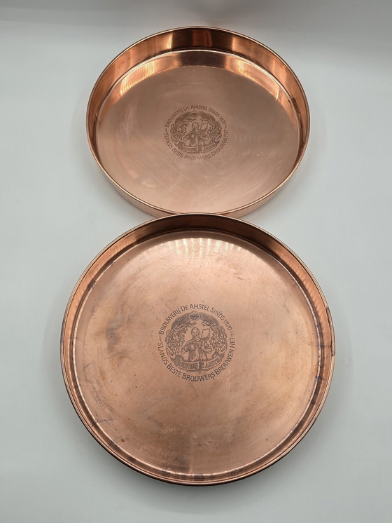 Image 1 of 2 X plateaux de service en cuivre rouge vintage Amstel Beer