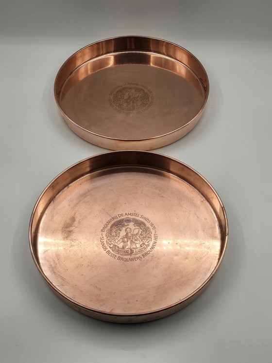 Image 1 of 2 X plateaux de service en cuivre rouge vintage Amstel Beer