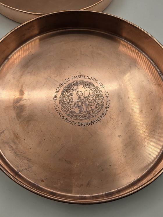 Image 1 of 2 X plateaux de service en cuivre rouge vintage Amstel Beer