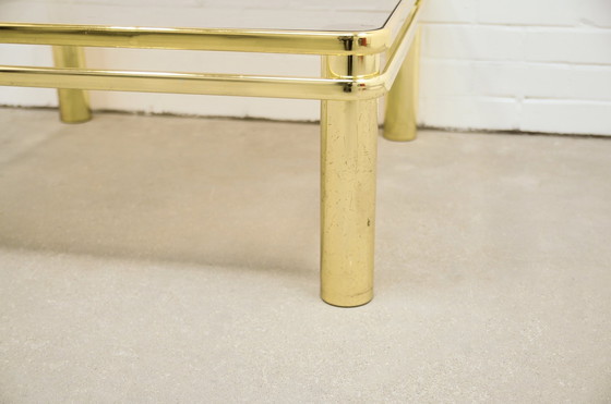 Image 1 of Table basse vintage en laiton verre fumé