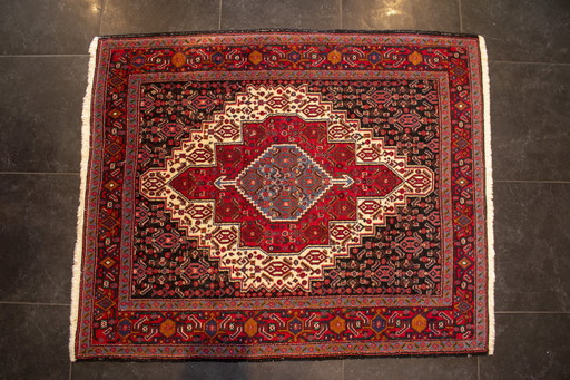 Tapis d'Orient en nuances de rouge