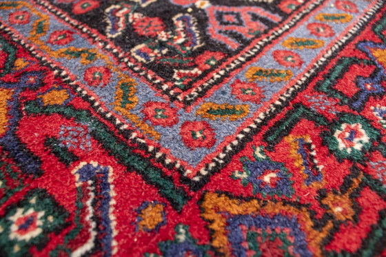 Image 1 of Tapis d'Orient en nuances de rouge