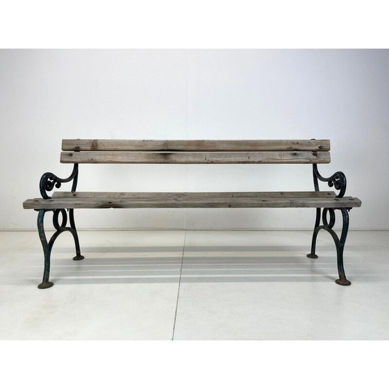 Image 1 of Banc massif en fonte et bois du Mid Century
