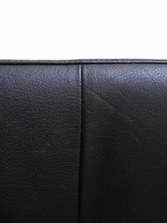 Image 1 of Pouf scandinave vintage original - Faux cuir noir et cadre en métal