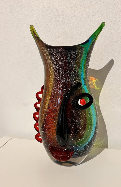 Vase en verre avec visage