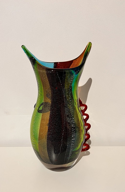 Vase en verre avec visage