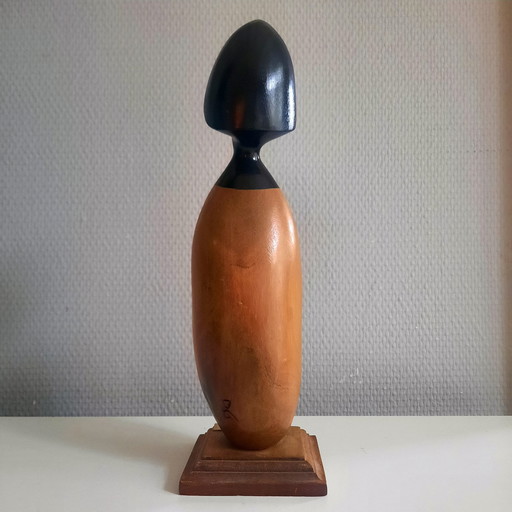 Figurine en bois peinte de Frank Coronado