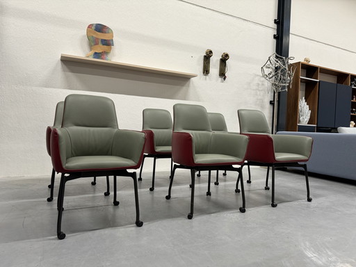 6 chaises de salle à manger Leolux Gyon à roulettes en cuir vert et rouge