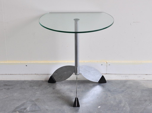 Table d'appoint design moderne avec plateau en verre et pied en acier inoxydable