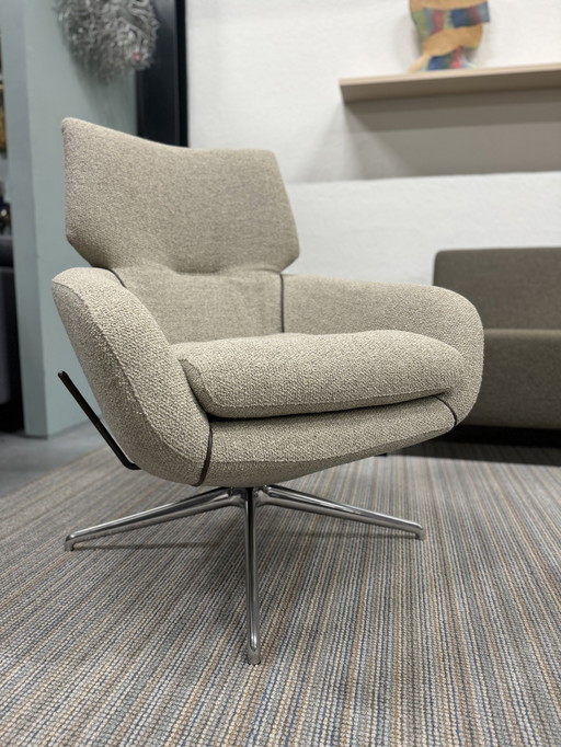 Leolux Lloyd Fauteuil avec pouf tissu Monza