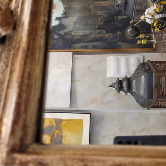 Image 1 of Miroir vintage dans un cadre en bois sculpté et doré