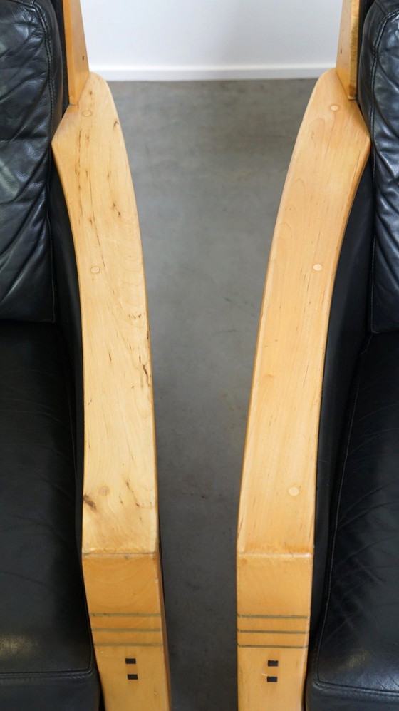 Image 1 of 2 X Fauteuils Schuitema en cuir noir avec bois fabriqués pour la Hollande-Amérique