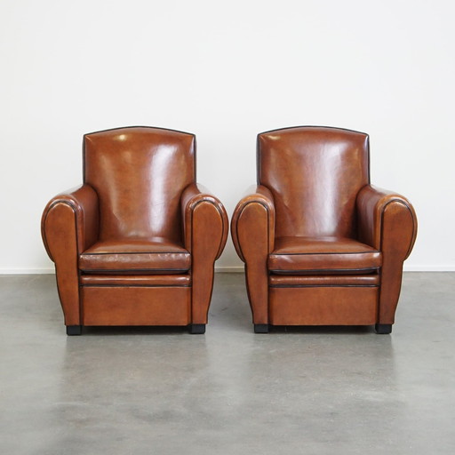 2 X Fauteuil design en peau de mouton