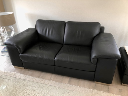 Natuzzi Canapé 2,5 places en cuir noir + Hocker