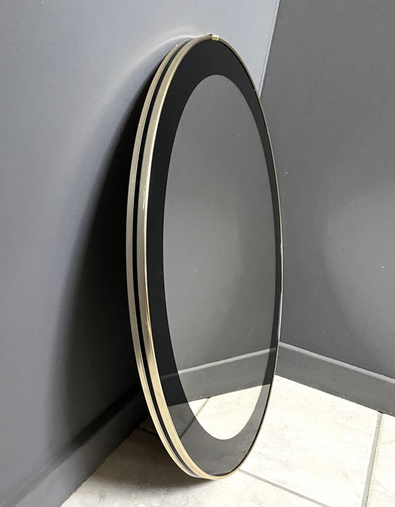 Image 1 of Miroir rond avec décoration noire 1960S