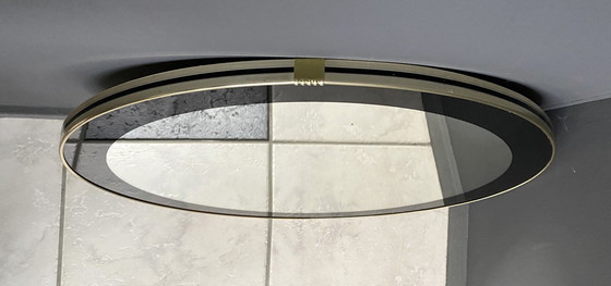 Image 1 of Miroir rond avec décoration noire 1960S