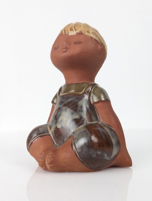 Figurine de garçon en céramique scandinave