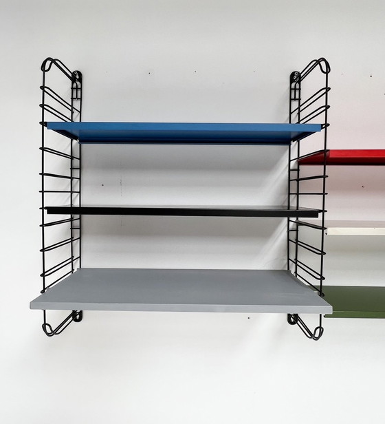 Image 1 of Étagère murale Tomado bleu/rouge, neuf pièces, A. Dekker, 1950's