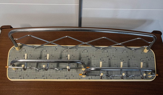 Image 1 of Porte-manteau vintage avec une belle toile de fond design