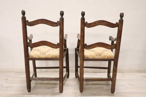 Image 1 of Fauteuils rustiques anciens en bois, 18e siècle