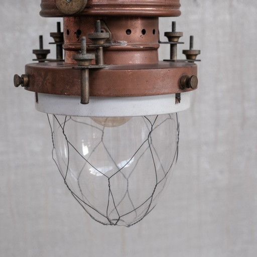 Lampe suspendue industrielle vintage en cuivre, laiton et verre, France années 1930