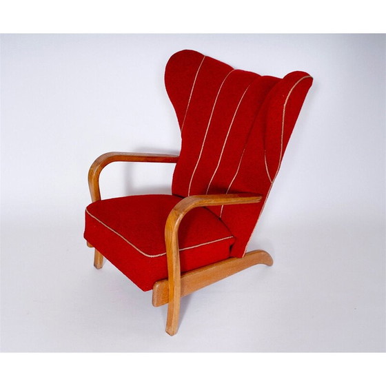 Image 1 of Fauteuil à oreilles rouge vintage 1950