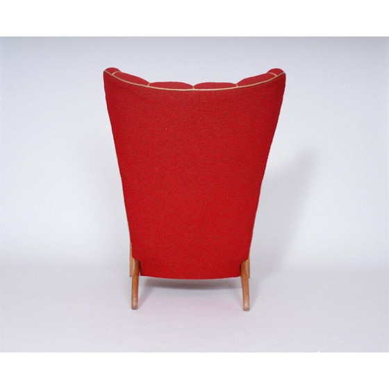 Image 1 of Fauteuil à oreilles rouge vintage 1950