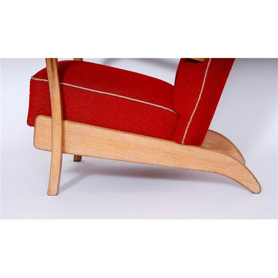Image 1 of Fauteuil à oreilles rouge vintage 1950