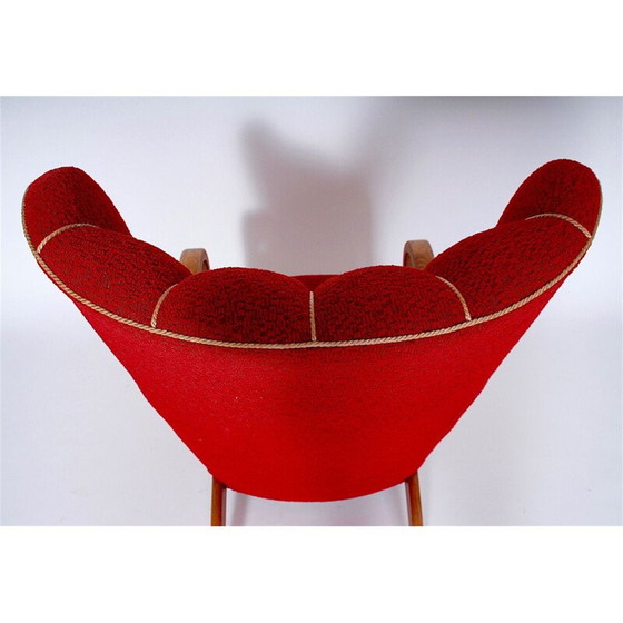 Image 1 of Fauteuil à oreilles rouge vintage 1950