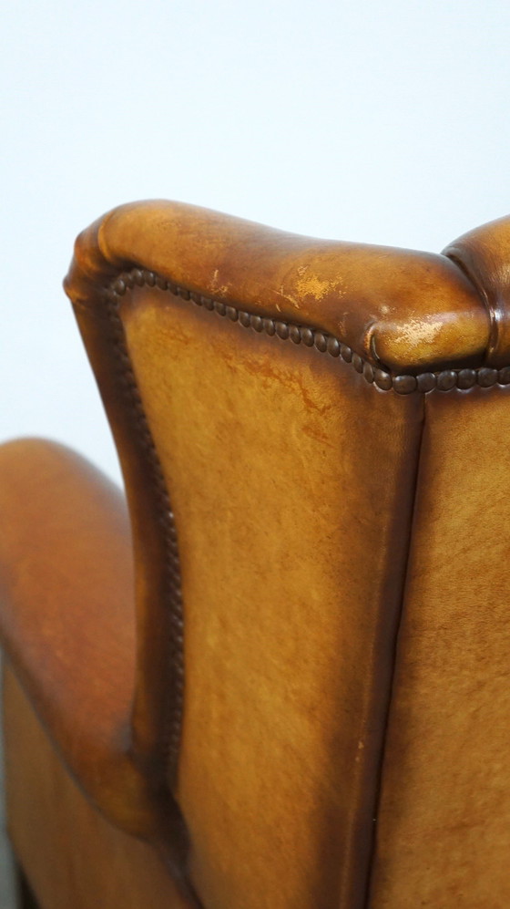 Image 1 of Fauteuil à oreilles en peau de mouton