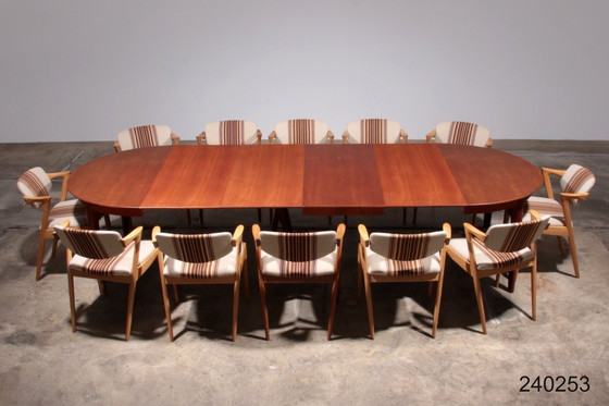 Image 1 of Table de salle à manger en teck des années 1960 par Henning Kjærnulf Modèle 62