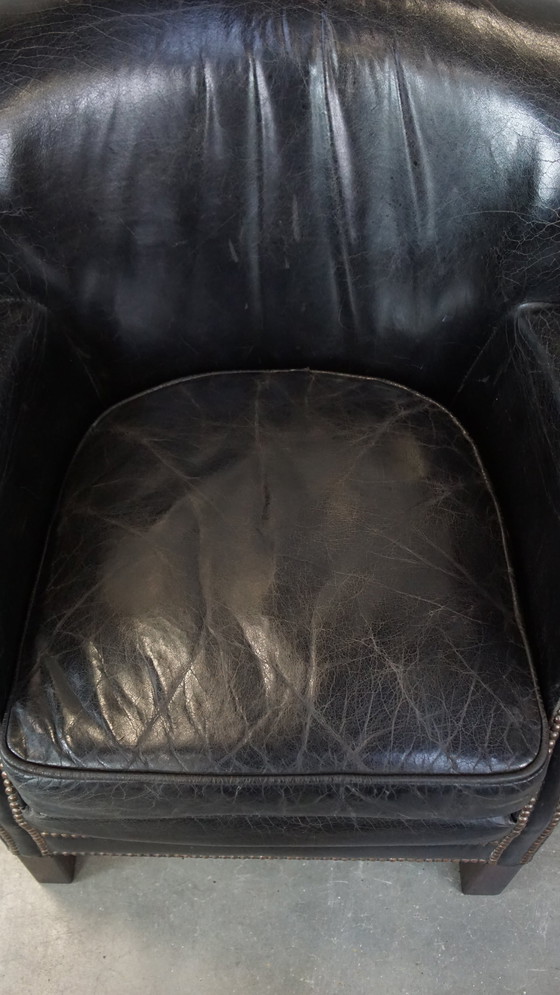 Image 1 of Fauteuil noir avec coussin d'assise réversible en kelim