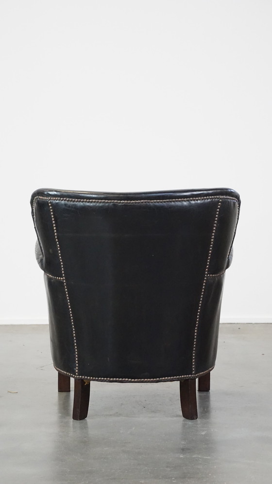 Image 1 of Fauteuil noir avec coussin d'assise réversible en kelim